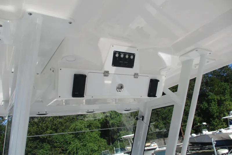 Slide: The Image of 2026 Sea Fox 328 Commander boat interior with control panel and speakers. - 19