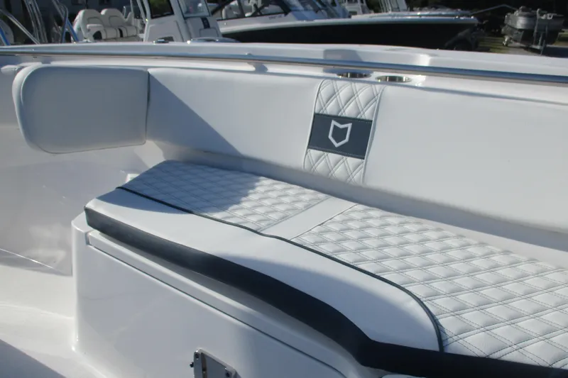Slide: The Image of 2026 Sea Fox 328 Commander boat interior with quilted seating and sleek design. - 22
