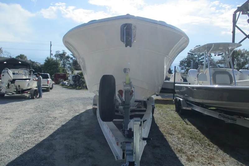 Slide: The Image of 2026 Sea Fox 328 Commander boat on trailer in outdoor lot. - 3