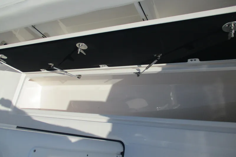 Slide: The Image of Open storage compartment on 2026 Sea Fox 328 Commander boat. - 7