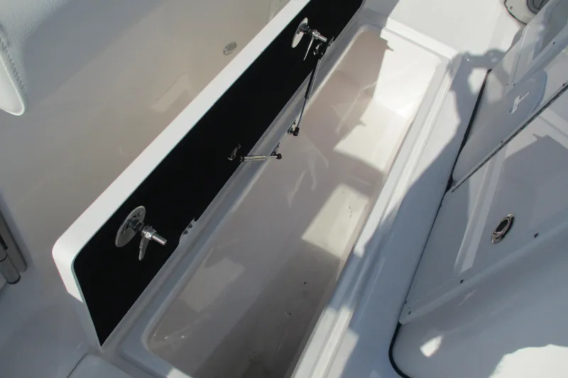 Slide: The Image of Storage compartment on 2026 Sea Fox 328 Commander boat, featuring sleek design and secure latches. - 8
