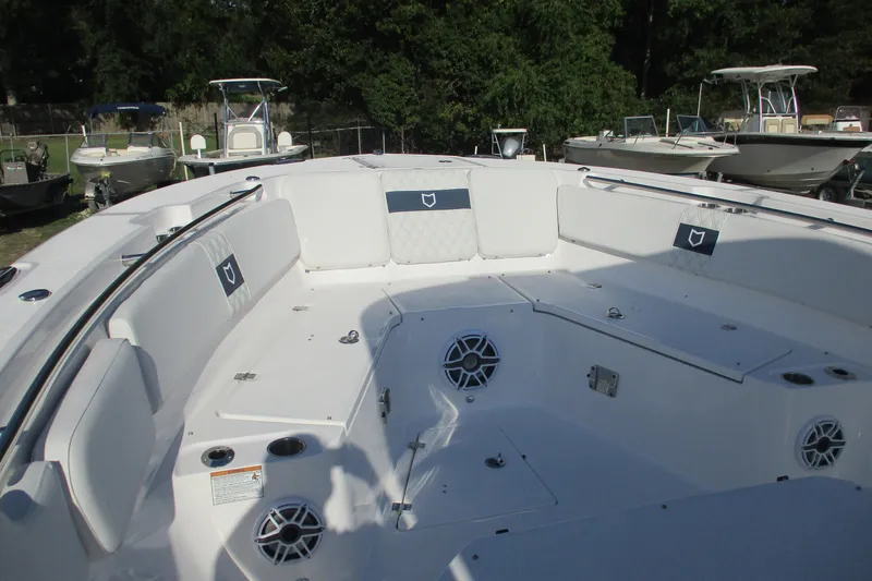 Slide: The Image of 2026 Sea Fox 328 Commander boat interior with seating and speakers. - 9