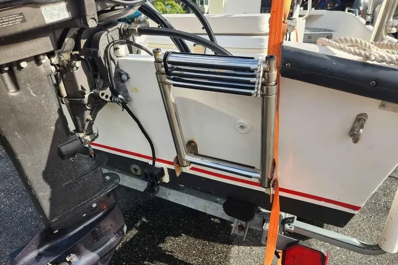 Slide: The Image of 2023 ROS Boats model 13 with motor and ladder detail. - 3