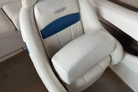 Slide: The Image of White and blue seat in 2000 Chaparral 196 SSi boat interior. - 12