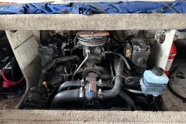 Slide: The Image of Engine compartment of a 2000 Chaparral 196 SSi boat, showing mechanical components. - 22