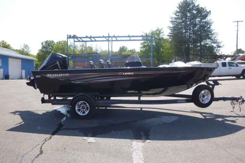 The Image of 2022 Ranger VS1882SC Angler boat on trailer in parking lot. - 0