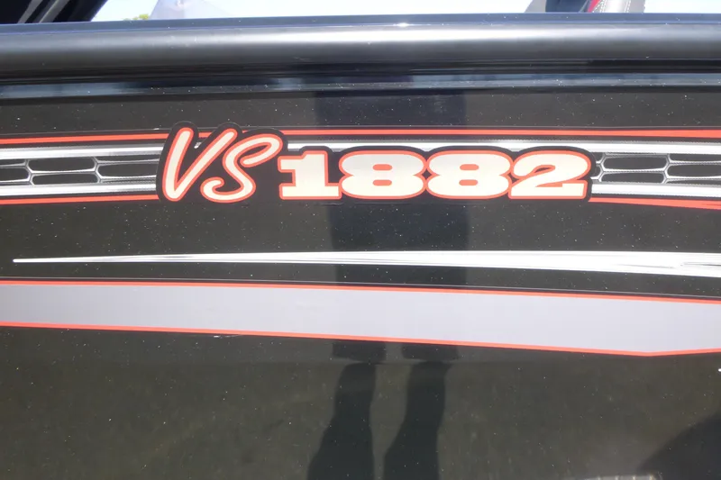 Slide: The Image of 2022 Ranger VS1882SC Angler boat model logo on black surface. - 14