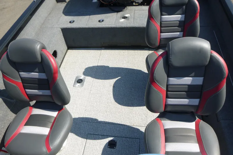 Slide: The Image of 2022 Ranger VS1882SC Angler boat interior with four cushioned seats, gray and red design. - 9