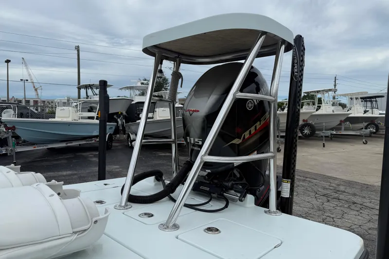 Slide: The Image of 2005 Maverick 18 HPX-V boat with Yamaha VMAX engine in a marina setting. - 12