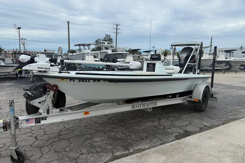 Slide: The Image of 2005 Maverick 18 HPX-V boat on trailer, equipped with Minn Kota trolling motor. - 14