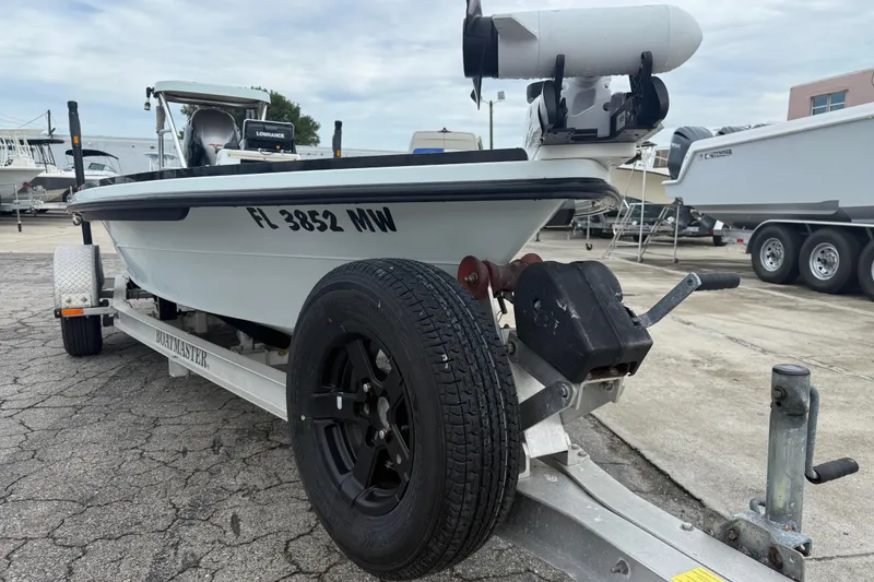Slide: The Image of 2005 Maverick 18 HPX-V boat on trailer, parked in a marina. - 3
