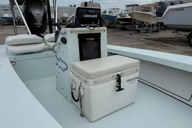 Slide: The Image of 2005 Maverick 18 HPX-V boat interior with Lowrance equipment and Frigid Rigid cooler. - 4