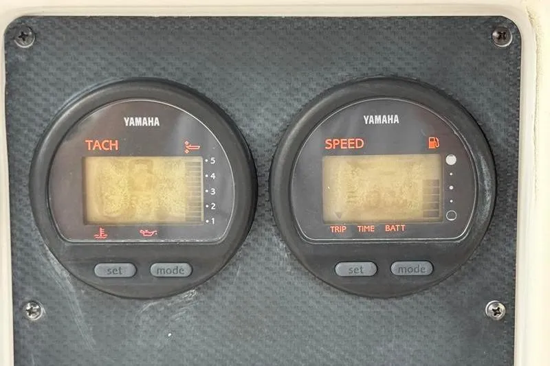 Slide: The Image of Yamaha tachometer and speedometer on 2005 Grady-White Escape 209 boat dashboard. - 18