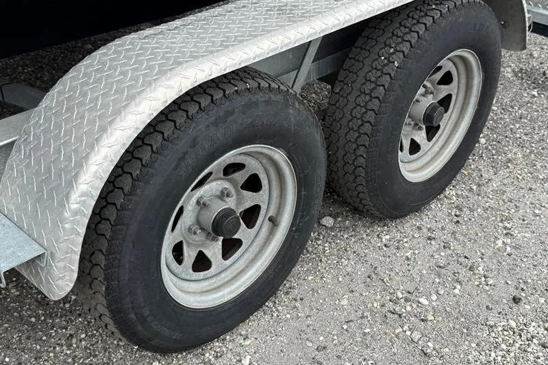 Slide: The Image of Trailer wheels with diamond plate fender for 2005 Grady-White Escape 209 boat. - 33