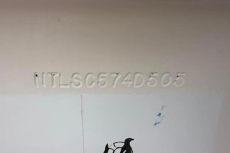 Slide: The Image of Hull identification number on 2005 Grady-White Escape 209 boat. - 35