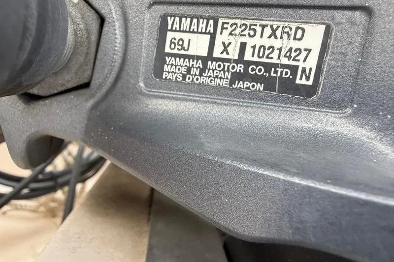 Slide: The Image of Yamaha motor label on a 2005 Grady-White Escape 209 boat engine. - 37