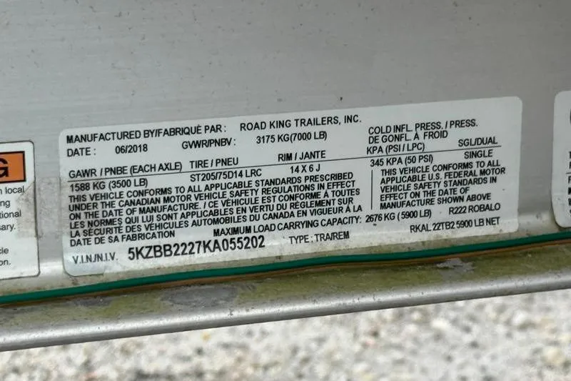 Slide: The Image of Label on Road King trailer, manufactured 06/2018, showing specifications and compliance details. - 38