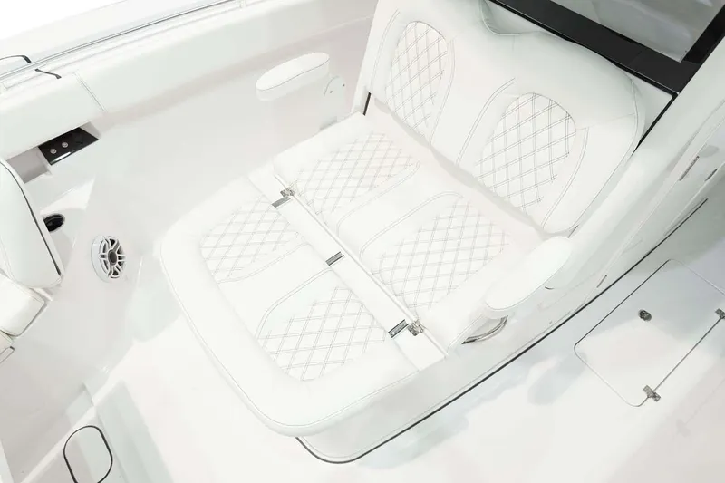 Slide: The Image of Manufacturer Provided Image: Luxurious seating on 2025 Sportsman Open 322 Center Console boat, featuring diamond-stitched upholstery. - 10