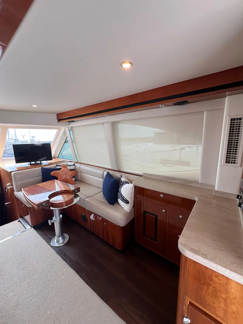 Slide: The Image of Luxurious interior of 2016 Riviera 45 OPEN yacht with elegant seating and modern amenities. - 6
