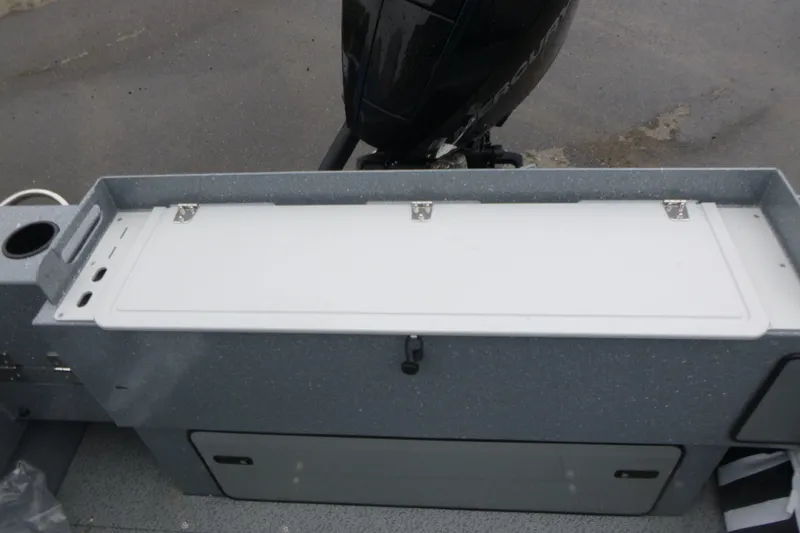 Slide: The Image of 2026 KingFisher 2025 Escape boat with storage compartment and outboard motor. - 16