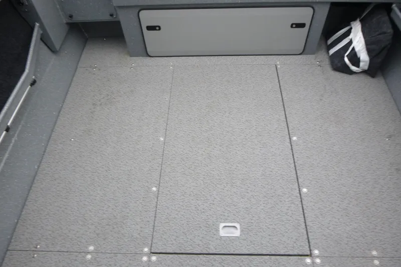 Slide: The Image of Interior of 2026 KingFisher 2025 Escape boat with gray textured flooring. - 18