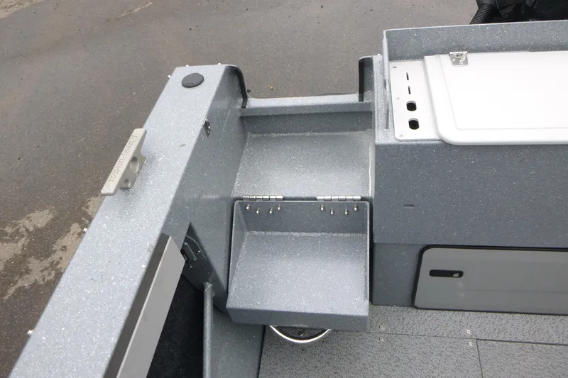 Slide: The Image of Interior view of 2026 KingFisher 2025 Escape boat, featuring storage compartments and sleek design. - 22