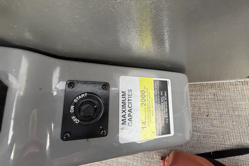 Slide: The Image of 2023 TAHOE AVALON Cascade boat ignition switch and capacity label, 14 persons or 2000 lbs. - 8