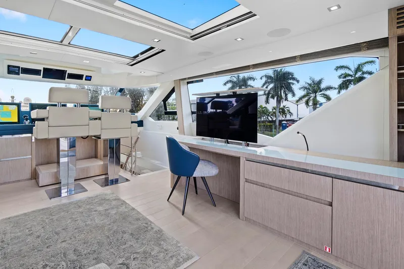 Slide: The Image of Luxurious interior of 2021 Monte Carlo Yachts MCY 76 Skylounge with modern furnishings. - 13