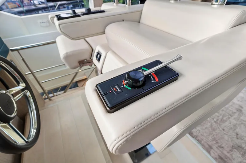 Slide: The Image of Luxurious interior of 2021 Monte Carlo Yachts MCY 76 Skylounge with modern controls. - 18