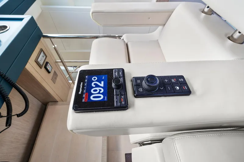 Slide: The Image of Control panel on Monte Carlo Yachts MCY 76 Skylounge, 2021 model, featuring navigation instruments. - 19