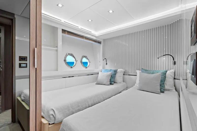 Slide: The Image of Luxurious twin cabin in 2021 Monte Carlo Yachts MCY 76 Skylounge. - 35