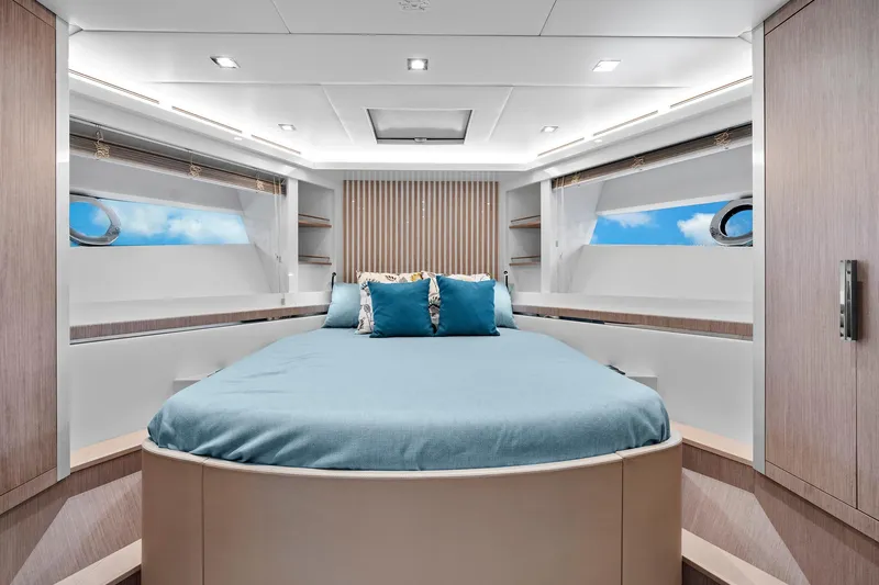 Slide: The Image of Luxurious bedroom interior of 2021 Monte Carlo Yachts MCY 76 Skylounge. - 37