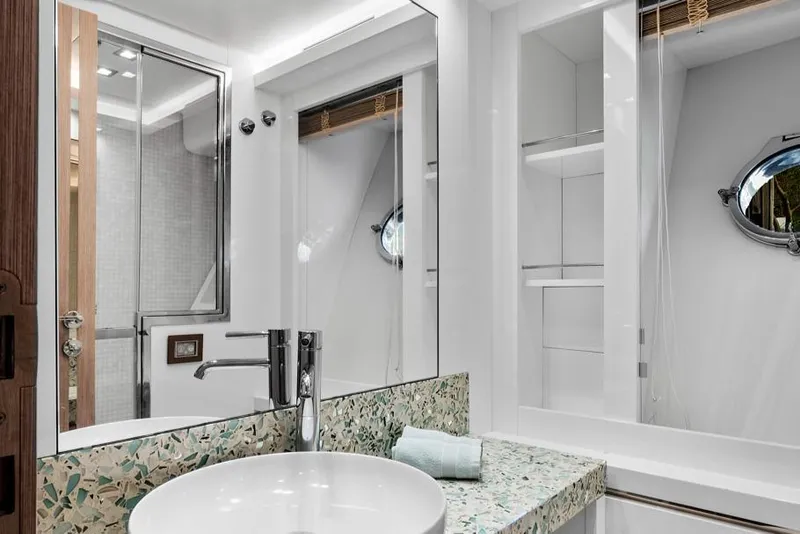 Slide: The Image of Luxurious bathroom in 2021 Monte Carlo Yachts MCY 76 Skylounge with modern fixtures and elegant design. - 38
