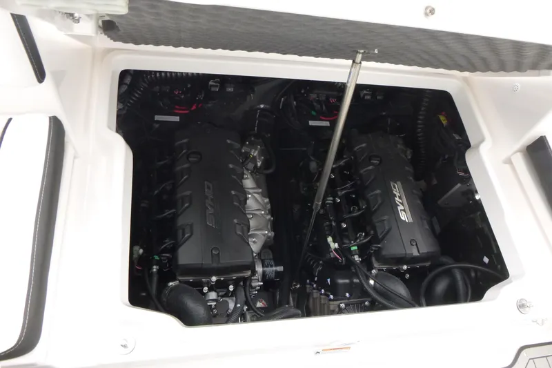 Slide: The Image of Engine compartment of 2026 Yamaha Boats 255 FSH Sport H, featuring dual SVHO engines. - 16