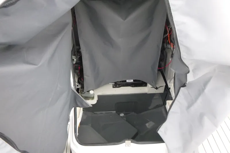 Slide: The Image of Interior view of 2026 Yamaha Boats 255 FSH Sport H, showcasing storage compartment. - 8