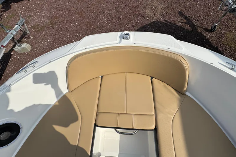 Slide: The Image of 2021 Sea Ray SPX 190 Outboard boat with tan seating in bow area. - 11