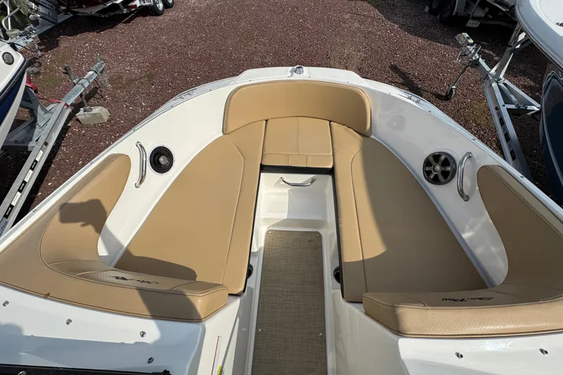 Slide: The Image of 2021 Sea Ray SPX 190 Outboard boat interior with tan seating and speaker system. - 8