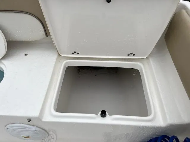 Slide: The Image of Open storage compartment on a 2020 Key West 239 FS boat. - 10