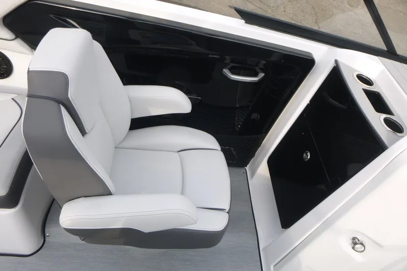 Slide: The Image of 2026 Yamaha Boats AR250 interior with sleek seating and modern console design. - 11