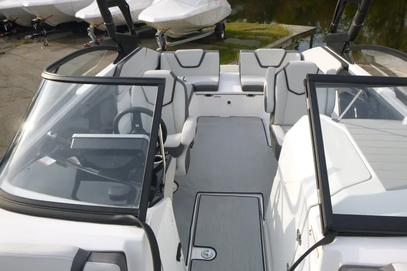 Slide: The Image of 2026 Yamaha Boats AR250 interior with sleek seating and modern design. - 5