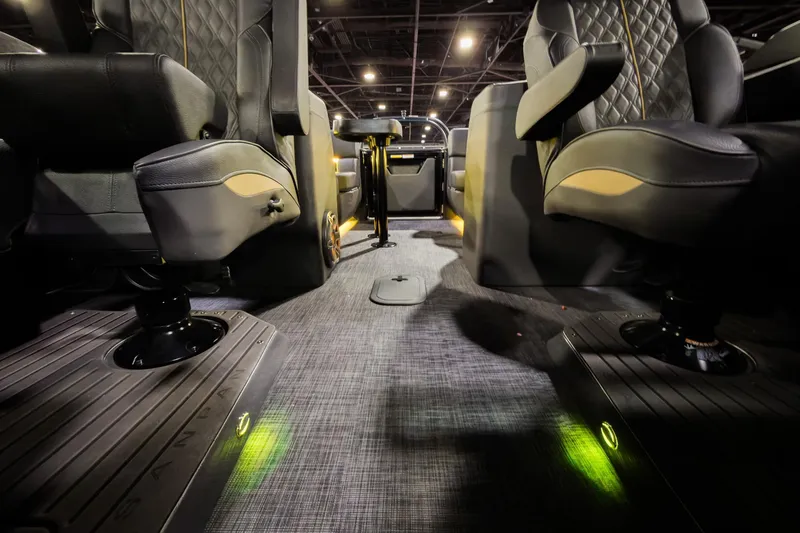 Slide: The Image of Luxurious interior of 2026 Godfrey SanPan 25' Split Bench Windshield boat. - 28