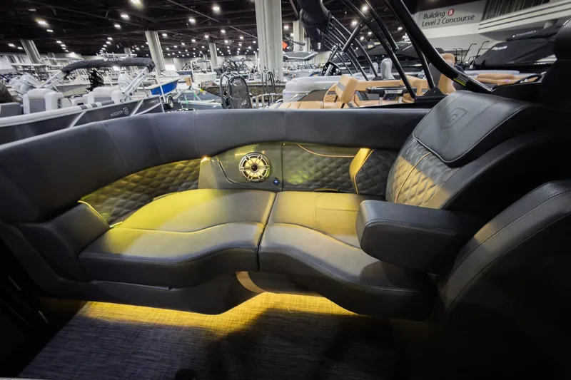 Slide: The Image of Luxurious interior of 2026 Godfrey SanPan 25' Split Bench Windshield boat with ambient lighting. - 31