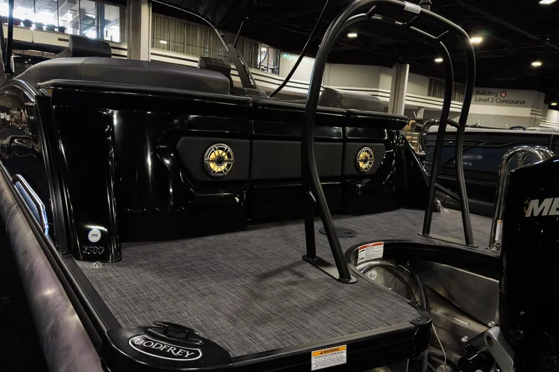 Slide: The Image of 2026 Godfrey SanPan 25' Split Bench Windshield boat interior with sleek design and modern features. - 33