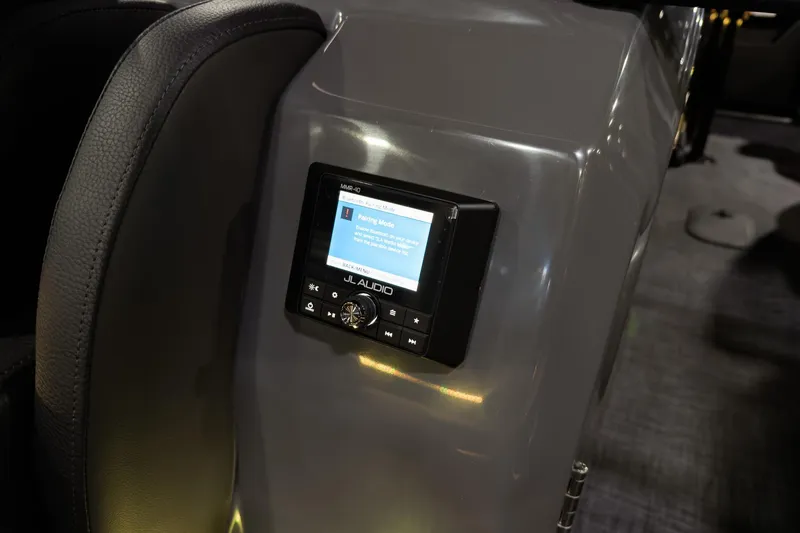 Slide: The Image of JL Audio system on 2026 Godfrey SanPan 25' Split Bench Windshield boat console. - 35