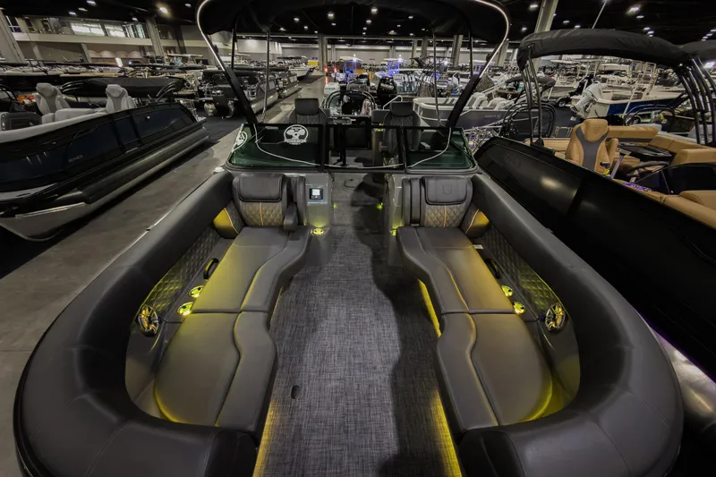 Slide: The Image of Luxurious 2026 Godfrey SanPan 25' Split Bench Windshield boat interior with ambient lighting. - 6