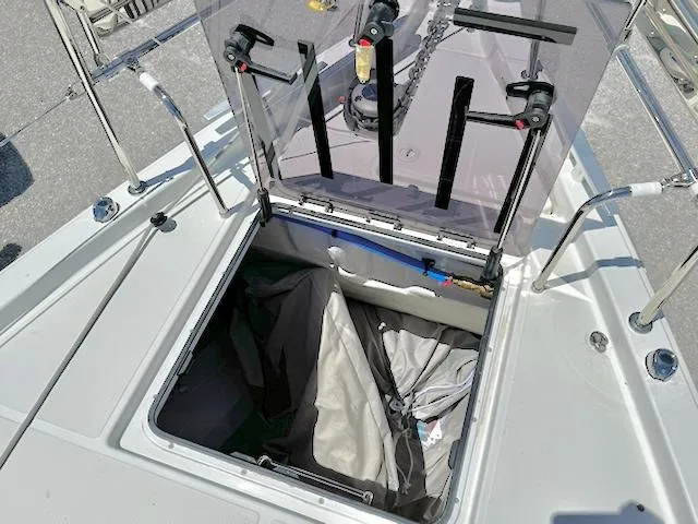 Slide: The Image of Open hatch on 2023 Jeanneau Sun Odyssey 490 sailboat deck. - 16