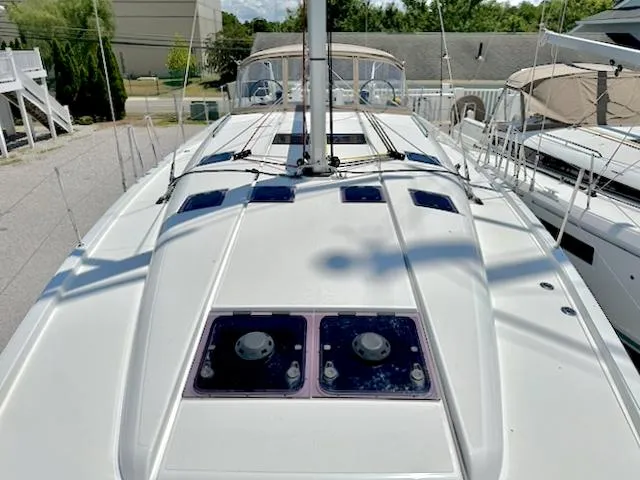 Slide: The Image of 2023 Jeanneau Sun Odyssey 490 sailboat deck view, showcasing sleek design and modern features. - 17
