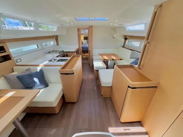 Slide: The Image of Luxurious interior of 2023 Jeanneau Sun Odyssey 490 yacht with modern furnishings. - 25
