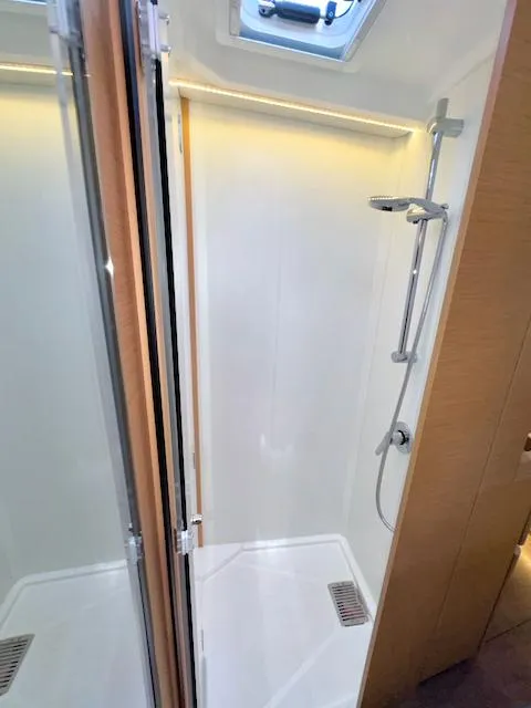 Slide: The Image of Modern shower in 2023 Jeanneau Sun Odyssey 490 yacht bathroom. - 31