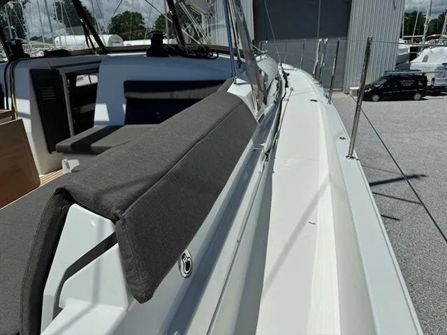 Slide: The Image of 2023 Jeanneau Sun Odyssey 490 yacht deck, featuring sleek design and comfortable seating. - 5
